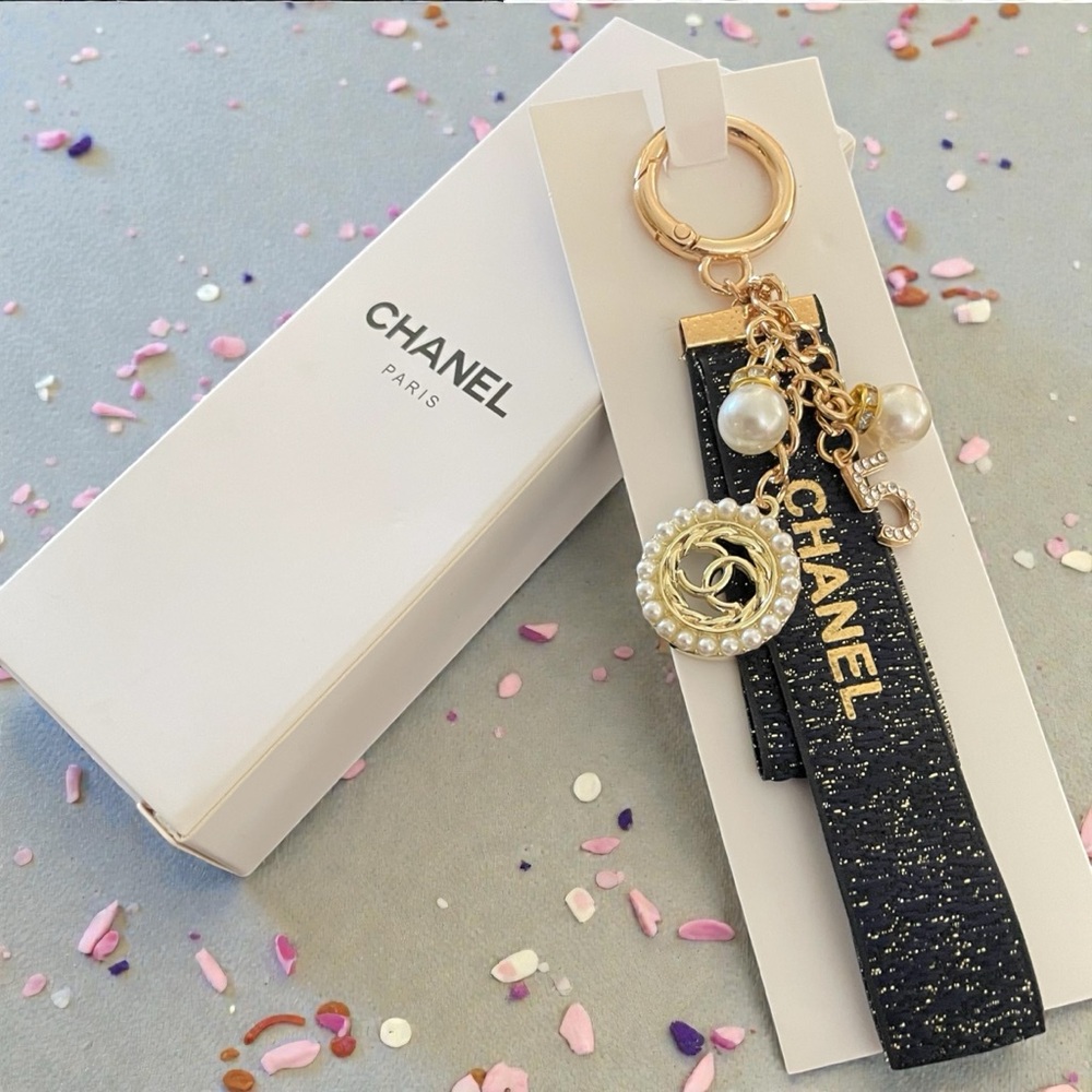CHANEL Glittery Black and Gold Key Chain